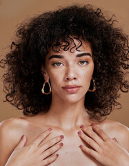 Skincare, makeup and face of a woman for wellness, health and luxury from spa against a brown...