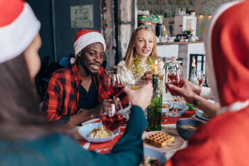 Friends celebrating Christmas or New Year eve.