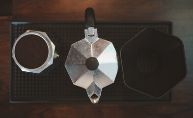 Brew dark roast coffee with a Moka pot in the morning. with a manual coffee press The resulting coffee is very aromatic.
