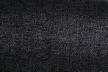 Part of dark jeans.