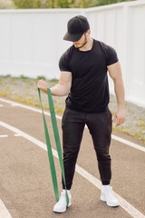 Male athlete doing fitness training. Workout outside the gym.