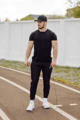 Male athlete doing fitness training. Workout outside the gym.