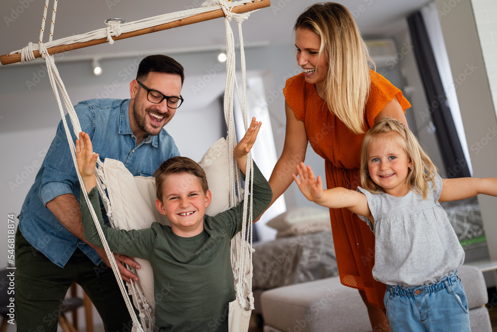 Wall mural Happy family having fun and spending time together at home - Wall murals