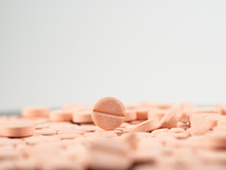 Lots of pink pills. Background from pink pills. medicine in tablets.
