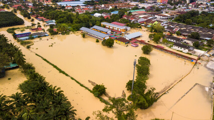 Aerial view of Dengkil district from flooding that causes damage of the infrastructure and housing area. Selective focus, contains dust and grain