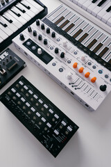 Synthesizers keyboards on white background