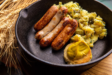 German sausages with pasta and mustard