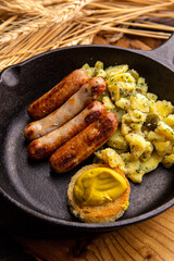 German sausages with pasta and mustard