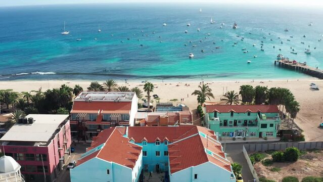 Unveiling the tropical beach and ocean in Santa Maria, Sal Island - Cape Verde.
Scenic drone view of the panorama.