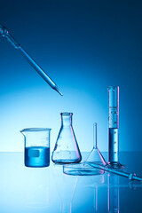 glassware with blue liquid and tubes