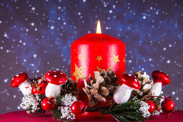 advent wreath with burning candle