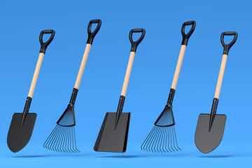 Garden shovel, pitchfork and rake on blue background, summer camping concept