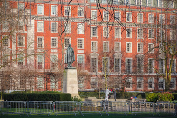 Grosvenor Square, a large public garden square in the Mayfair district of London, England