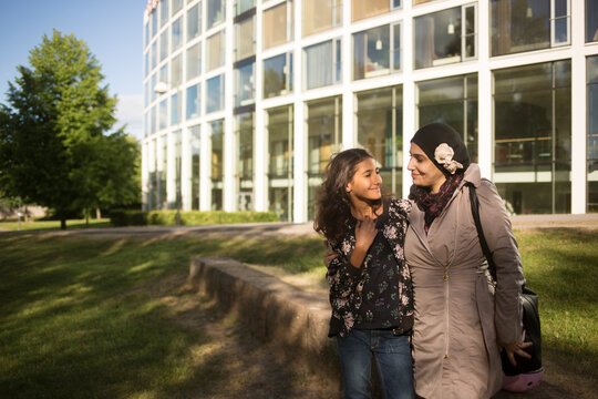 Woman and daughter in park