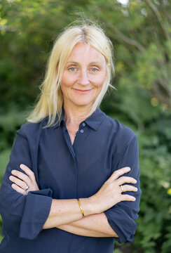 Portrait Of Mature Woman In Blue Shirt