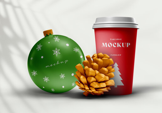 Christmas Coffee Cup and Ornament Ball Mockup &ndash; Festive Holiday Branding Scene with Pinecone Decoration &ndash; Realistic High-Resolution Setup for Seasonal Packaging and Advertising