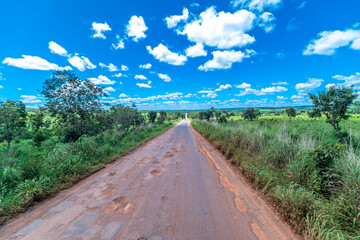 Fototapeta na wymiar dirt road with potholes in Brazil