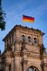 German flag over Reichstag Building in Berlin