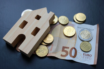 Concept de maison et monnaie euro