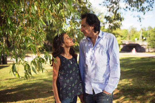 Man and daughter in park
