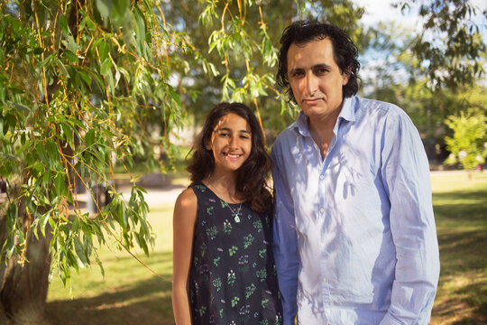 Man and daughter in park