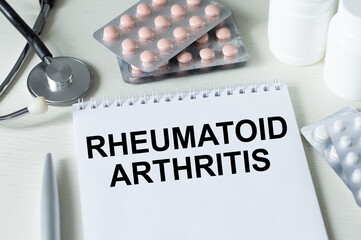 Rheumatoid arthritis inscription on a notebook on a doctor's desk, a medical concept