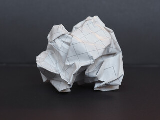 Obraz premium white paper ball over dark gray background