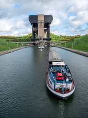 barge near ship elevator of strepy-thieu in canal between brussels and charleroi in belgium