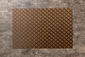 Top view of brown tablecloth for food on cement background. Empty space for your design