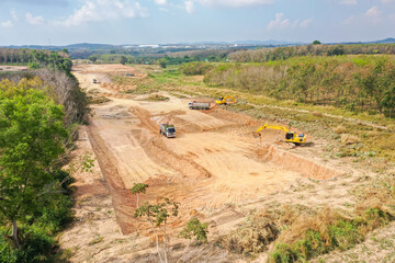 Aerial view of excavator at construction site. Aerial drone Photo a construction site. Heavy...