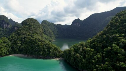 Beautiful Dayang Bunting Lake in Malaysia, cinematic drone push in shot. 