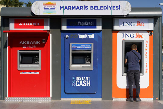 Istanbul, Turkey - November 17, 2022: ATMs of Turkish banks on the street of Istanbul. Currency exchange, turkish lira exchange rate, economy and inflation concept.