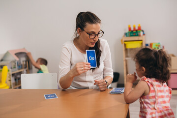 teacher Learning letters in preschool