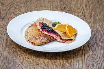 pancake with fruit and marmalade for breakfast and as dessert