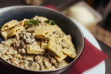 prepared cooked pasta carbonara=served in a bowl 