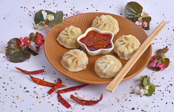 Round Shaped Momos served with Red Chilli