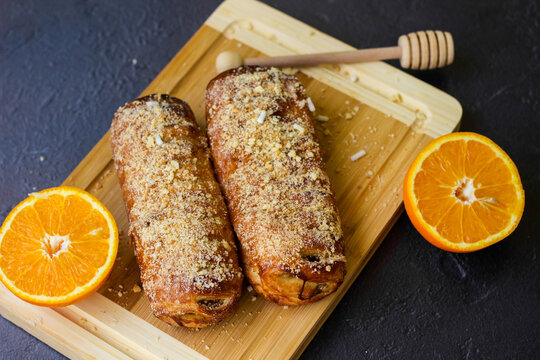 Tasty Puff Pastry Roll With Orange And Walnuts