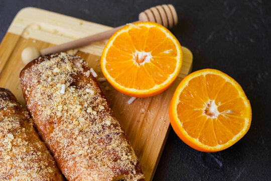 Tasty Puff Pastry Roll With Orange And Walnuts