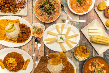 Set of Ecuadorian food recipes, maduros with cheese, corn with cheese, onion with prawns, cancha, chaulafan rice, torreznos with corn, fried yucca and others