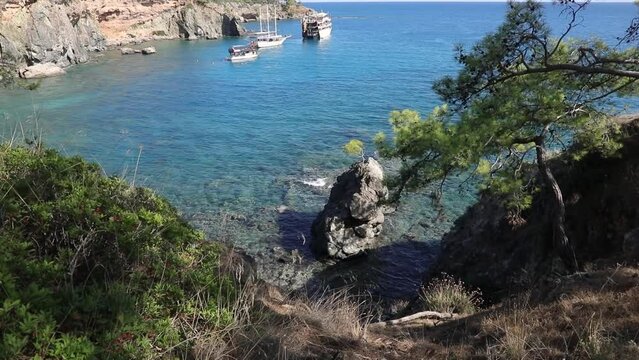Tourist ships in the bay near Phaselis Ancient City