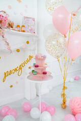 Birthday decoration in pink colors for baby girl 