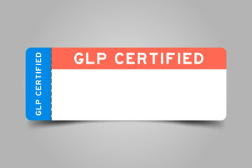 Blue and orange color ticket with word GLP (Abbreviation of Good laboratory practice) certified and white copy psace on gray background