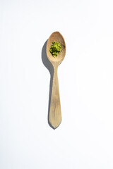 Wooden spoon on white background