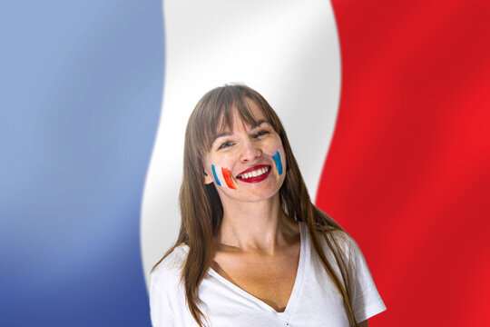 France national team football fans cheering their team at the 2022 world championships, football fans with their faces painted against the country's flag; France fans