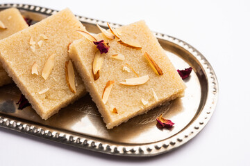 Rava barfi or sooji burfi or barfee is an Indian Sweet made with semolina, sugar, ghee and almonds