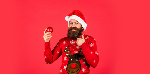 Run xmas party. Organise party. Winter inspiration. New year party decor. Decor shop sales. Prepare for holiday. Ready to celebrate. Bearded man hold christmas decoration. Decorate your home