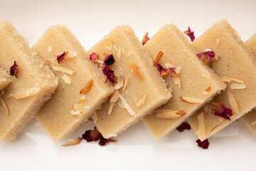 Rava barfi or sooji burfi or barfee is an Indian Sweet made with semolina, sugar, ghee and almonds