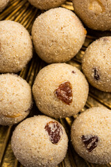Rava Laddu or sooji ladoo is an Indian Sweet made with semolina, sugar, ghee, cashews and raisins