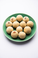Rava Laddu or sooji ladoo is an Indian Sweet made with semolina, sugar, ghee, cashews and raisins