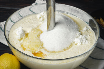 The process of kneading dough. Mixing ingredients. Preparing batter. Recipe for waffle dough. Preparing dough for pancakes.